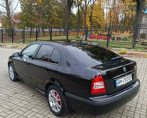 Черный Шкода Октавия, объемом двигателя 1.6 л и пробегом 300 тыс. км за 4600 $, фото 9 на Automoto.ua