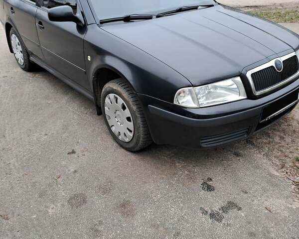 Черный Шкода Октавия, объемом двигателя 1.6 л и пробегом 260 тыс. км за 6500 $, фото 1 на Automoto.ua