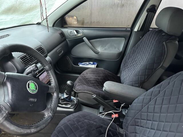 Черный Шкода Октавия, объемом двигателя 1.6 л и пробегом 210 тыс. км за 5200 $, фото 5 на Automoto.ua