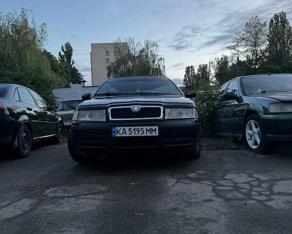 Черный Шкода Октавия, объемом двигателя 1.6 л и пробегом 250 тыс. км за 5200 $, фото 3 на Automoto.ua