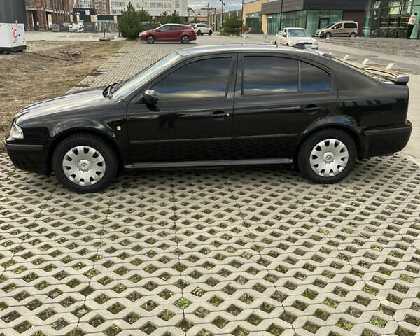 Чорний Шкода Октавія, об'ємом двигуна 1.6 л та пробігом 244 тис. км за 5700 $, фото 2 на Automoto.ua