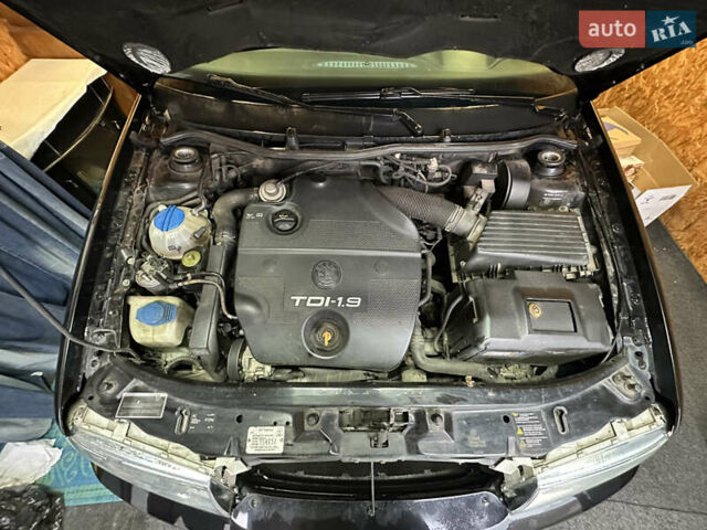 Черный Шкода Октавия, объемом двигателя 1.9 л и пробегом 302 тыс. км за 5950 $, фото 20 на Automoto.ua