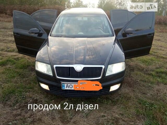Черный Шкода Октавия, объемом двигателя 2 л и пробегом 283 тыс. км за 5500 $, фото 1 на Automoto.ua