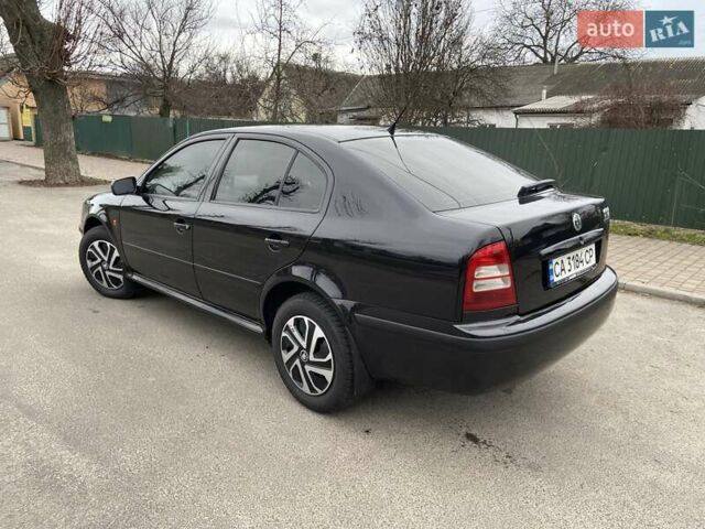 Черный Шкода Октавия, объемом двигателя 1.6 л и пробегом 292 тыс. км за 5250 $, фото 5 на Automoto.ua