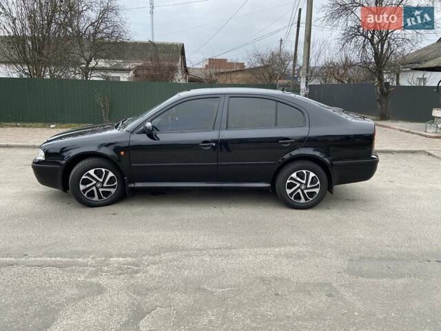 Черный Шкода Октавия, объемом двигателя 1.6 л и пробегом 292 тыс. км за 5250 $, фото 6 на Automoto.ua