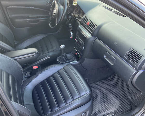 Черный Шкода Октавия, объемом двигателя 1.8 л и пробегом 273 тыс. км за 8800 $, фото 11 на Automoto.ua