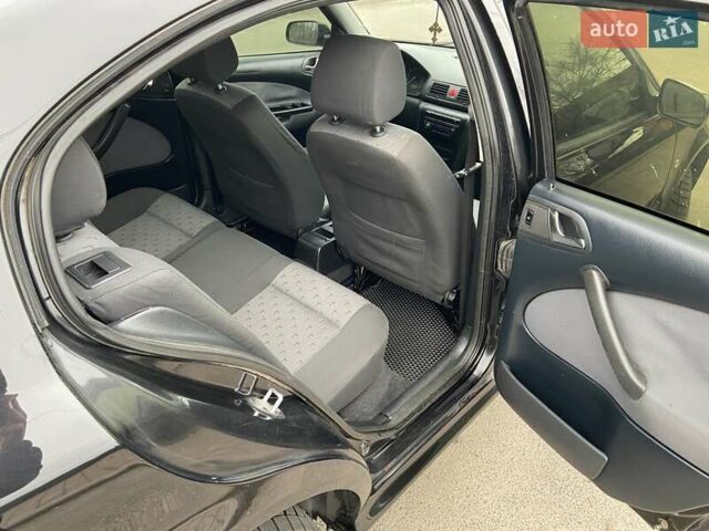 Черный Шкода Октавия, объемом двигателя 1.6 л и пробегом 292 тыс. км за 5250 $, фото 14 на Automoto.ua