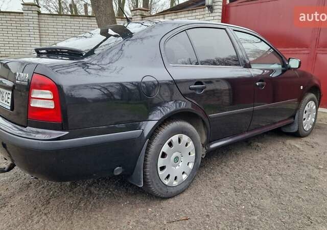 Черный Шкода Октавия, объемом двигателя 1.6 л и пробегом 268 тыс. км за 6500 $, фото 16 на Automoto.ua