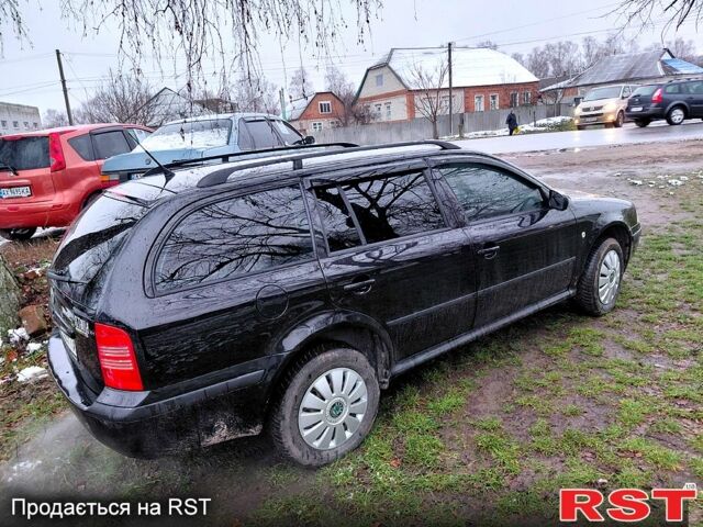 Черный Шкода Октавия, объемом двигателя 1.6 л и пробегом 187 тыс. км за 5700 $, фото 1 на Automoto.ua