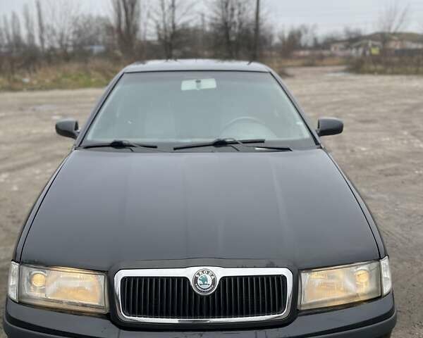 Черный Шкода Октавия, объемом двигателя 1.6 л и пробегом 204 тыс. км за 4100 $, фото 6 на Automoto.ua