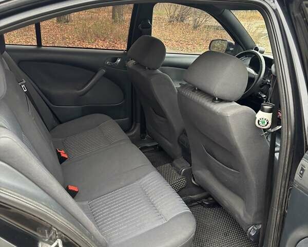 Черный Шкода Октавия, объемом двигателя 1.8 л и пробегом 297 тыс. км за 6500 $, фото 11 на Automoto.ua
