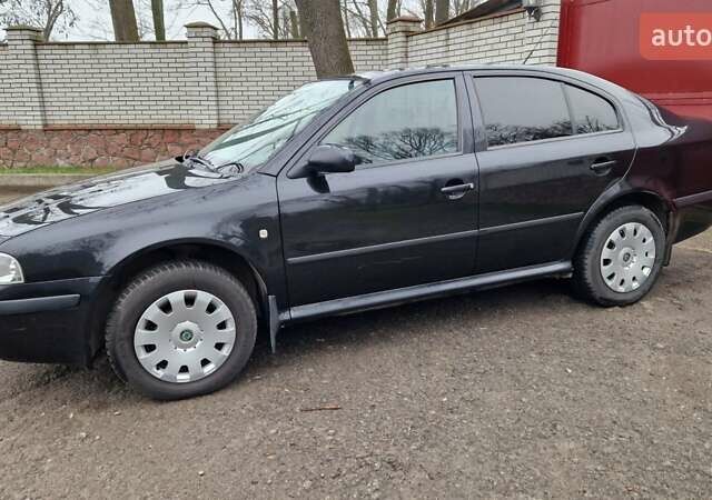 Черный Шкода Октавия, объемом двигателя 1.6 л и пробегом 268 тыс. км за 6500 $, фото 1 на Automoto.ua