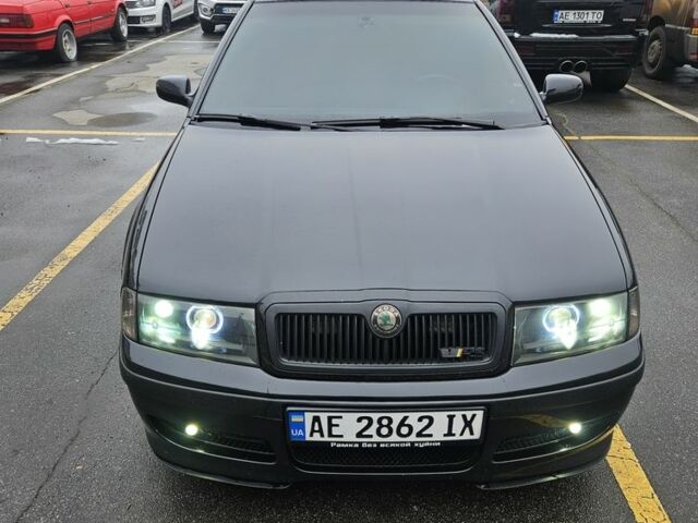 Черный Шкода Октавия, объемом двигателя 1.8 л и пробегом 337 тыс. км за 6700 $, фото 1 на Automoto.ua