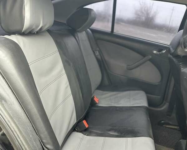 Черный Шкода Октавия, объемом двигателя 1.6 л и пробегом 204 тыс. км за 4100 $, фото 11 на Automoto.ua