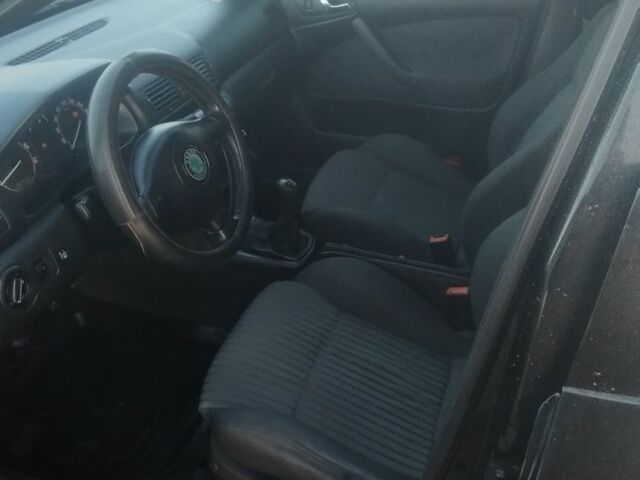 Черный Шкода Октавия, объемом двигателя 1.8 л и пробегом 270 тыс. км за 5400 $, фото 4 на Automoto.ua