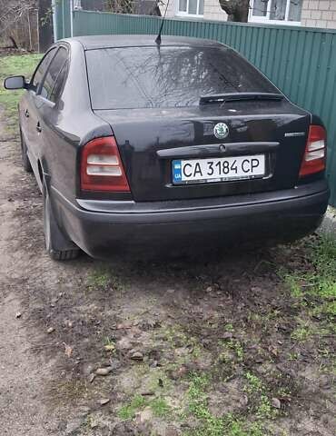 Черный Шкода Октавия, объемом двигателя 1.6 л и пробегом 292 тыс. км за 4500 $, фото 2 на Automoto.ua