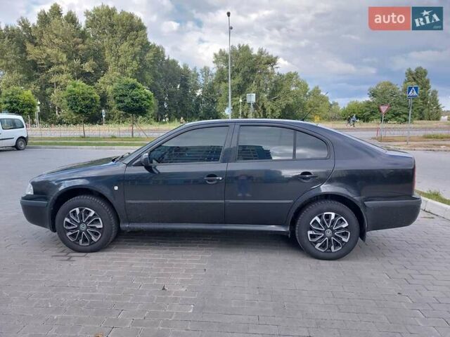 Черный Шкода Октавия, объемом двигателя 1.6 л и пробегом 285 тыс. км за 5300 $, фото 1 на Automoto.ua