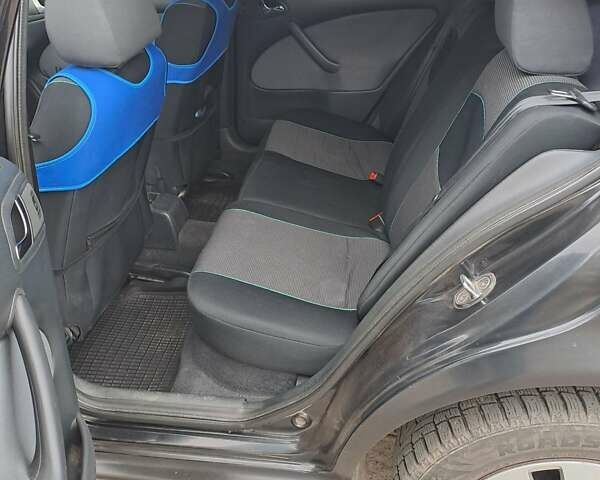 Черный Шкода Октавия, объемом двигателя 1.6 л и пробегом 260 тыс. км за 6500 $, фото 5 на Automoto.ua