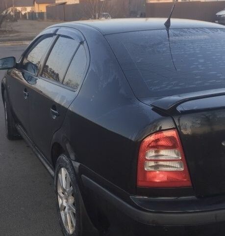 Черный Шкода Октавия, объемом двигателя 1.8 л и пробегом 270 тыс. км за 5400 $, фото 6 на Automoto.ua