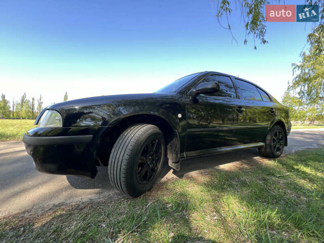 Чорний Шкода Октавія, об'ємом двигуна 1.6 л та пробігом 418 тис. км за 4150 $, фото 9 на Automoto.ua