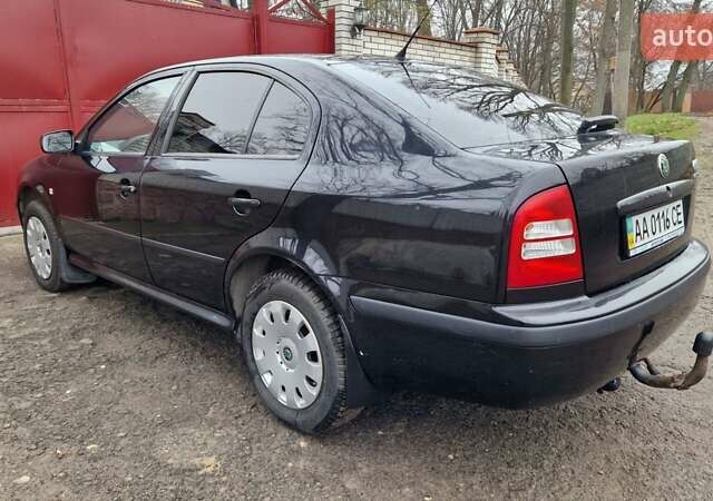 Черный Шкода Октавия, объемом двигателя 1.6 л и пробегом 268 тыс. км за 6500 $, фото 15 на Automoto.ua