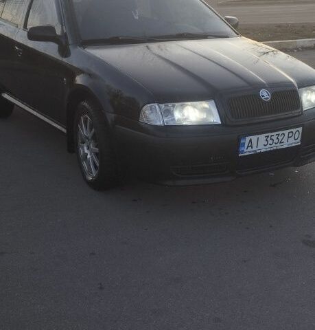 Черный Шкода Октавия, объемом двигателя 1.8 л и пробегом 270 тыс. км за 5400 $, фото 1 на Automoto.ua