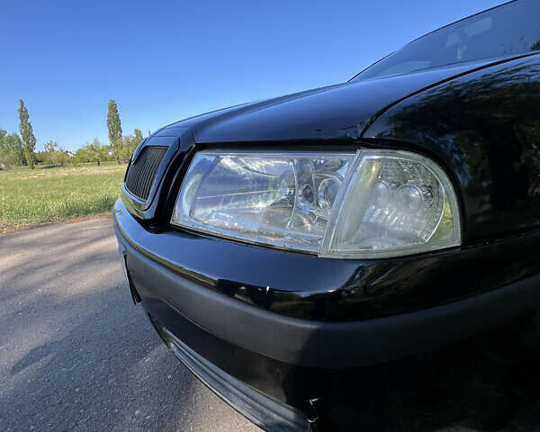 Чорний Шкода Октавія, об'ємом двигуна 1.6 л та пробігом 418 тис. км за 4150 $, фото 7 на Automoto.ua
