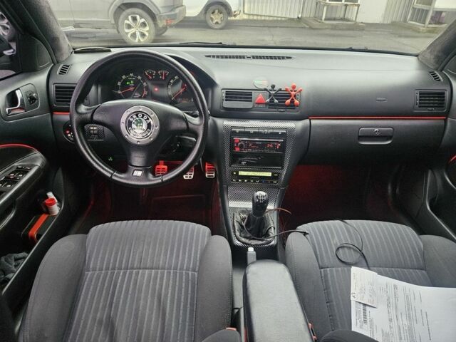 Черный Шкода Октавия, объемом двигателя 1.8 л и пробегом 337 тыс. км за 6700 $, фото 5 на Automoto.ua