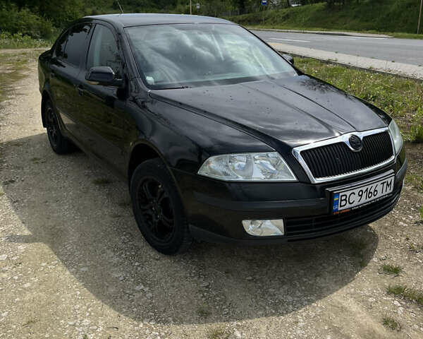 Черный Шкода Октавия, объемом двигателя 1.6 л и пробегом 200 тыс. км за 5200 $, фото 4 на Automoto.ua