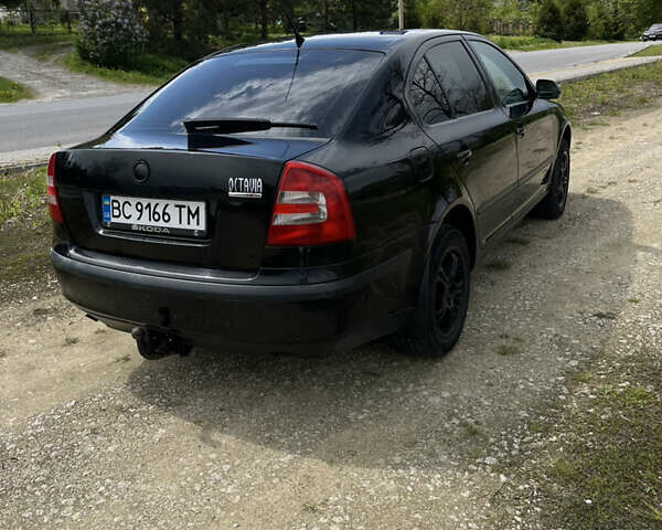 Черный Шкода Октавия, объемом двигателя 1.6 л и пробегом 200 тыс. км за 5200 $, фото 6 на Automoto.ua