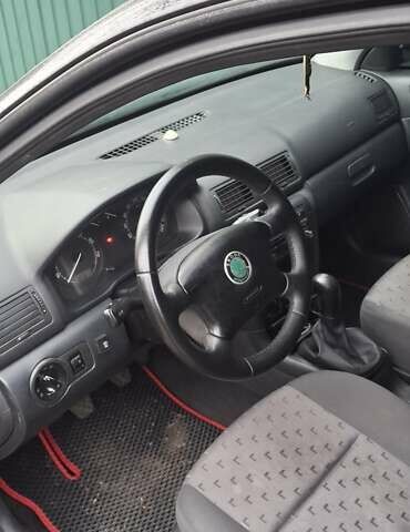 Черный Шкода Октавия, объемом двигателя 1.6 л и пробегом 292 тыс. км за 4500 $, фото 4 на Automoto.ua