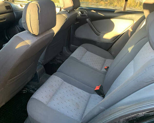 Черный Шкода Октавия, объемом двигателя 1.6 л и пробегом 260 тыс. км за 3700 $, фото 5 на Automoto.ua