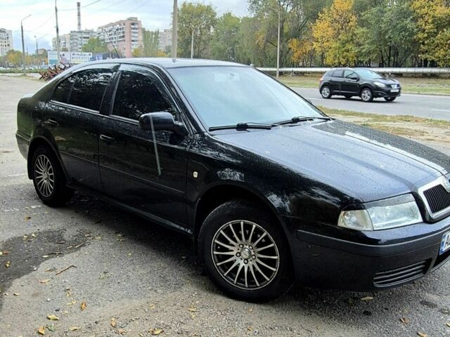 Черный Шкода Октавия, объемом двигателя 1.6 л и пробегом 310 тыс. км за 5350 $, фото 5 на Automoto.ua