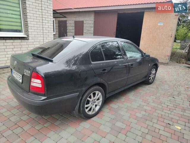 Черный Шкода Октавия, объемом двигателя 1.6 л и пробегом 300 тыс. км за 4500 $, фото 5 на Automoto.ua