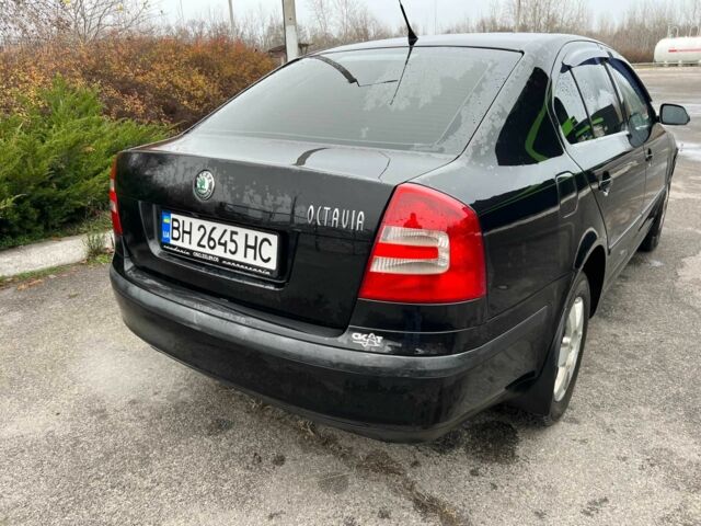 Черный Шкода Октавия, объемом двигателя 2 л и пробегом 240 тыс. км за 5400 $, фото 2 на Automoto.ua