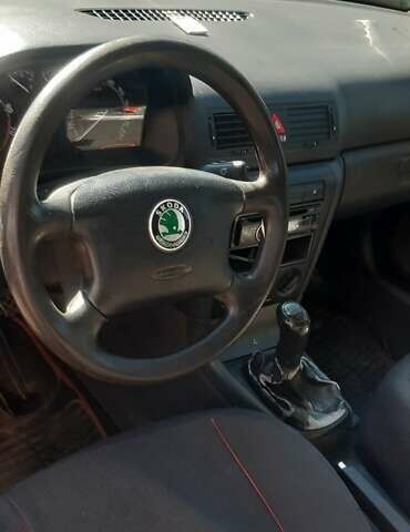 Черный Шкода Октавия, объемом двигателя 1.6 л и пробегом 170 тыс. км за 5200 $, фото 4 на Automoto.ua