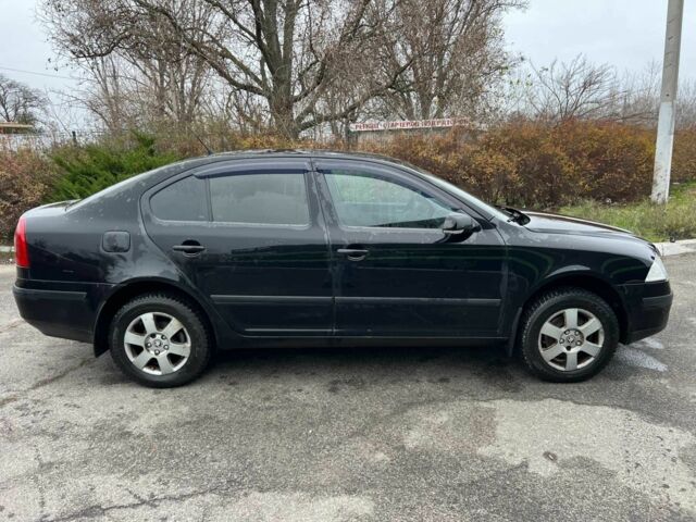 Черный Шкода Октавия, объемом двигателя 2 л и пробегом 240 тыс. км за 5400 $, фото 3 на Automoto.ua