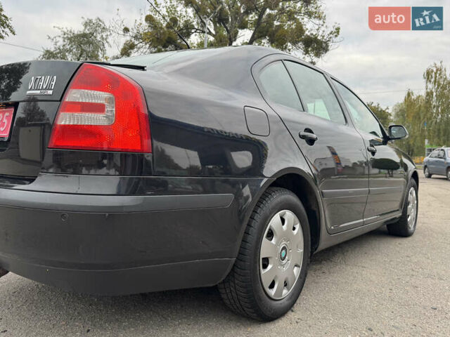 Шкода Октавія 2006 у Лубнах на Automoto.ua Чорний Шкода Октавія, об'ємом двигуна 1.6 л та пробігом 137 тис. км за 6550 $, фото 13 на Automoto.ua