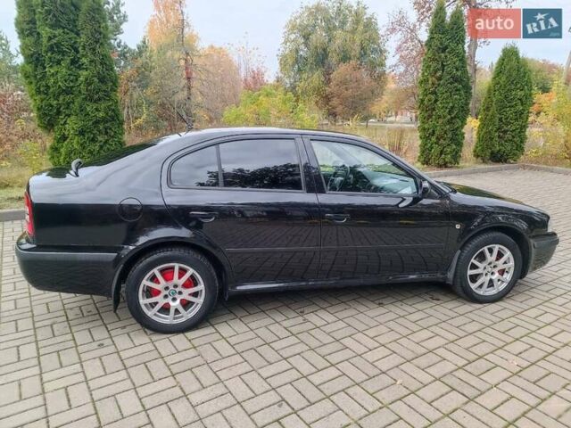 Черный Шкода Октавия, объемом двигателя 1.6 л и пробегом 300 тыс. км за 4600 $, фото 5 на Automoto.ua