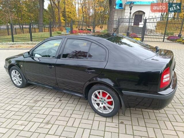 Черный Шкода Октавия, объемом двигателя 1.6 л и пробегом 300 тыс. км за 4600 $, фото 4 на Automoto.ua