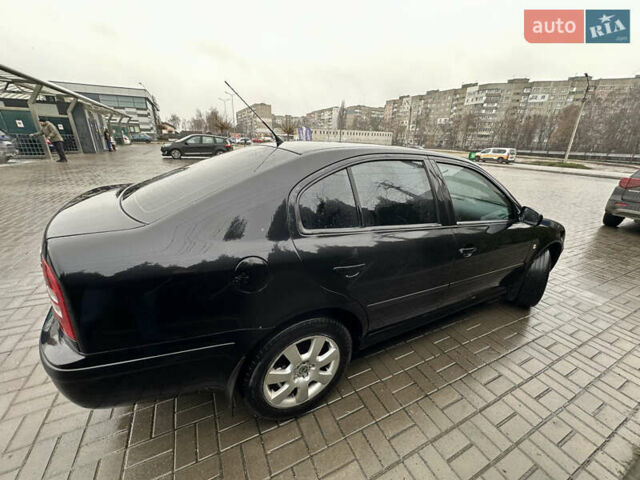 Черный Шкода Октавия, объемом двигателя 1.9 л и пробегом 302 тыс. км за 5950 $, фото 9 на Automoto.ua