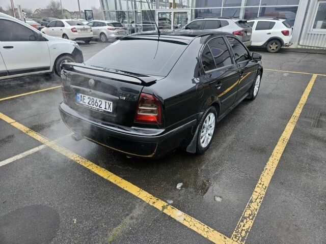 Черный Шкода Октавия, объемом двигателя 1.8 л и пробегом 337 тыс. км за 6700 $, фото 4 на Automoto.ua