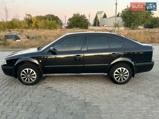 Черный Шкода Октавия, объемом двигателя 1.6 л и пробегом 190 тыс. км за 5300 $, фото 3 на Automoto.ua