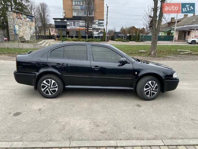 Черный Шкода Октавия, объемом двигателя 1.6 л и пробегом 292 тыс. км за 5250 $, фото 2 на Automoto.ua