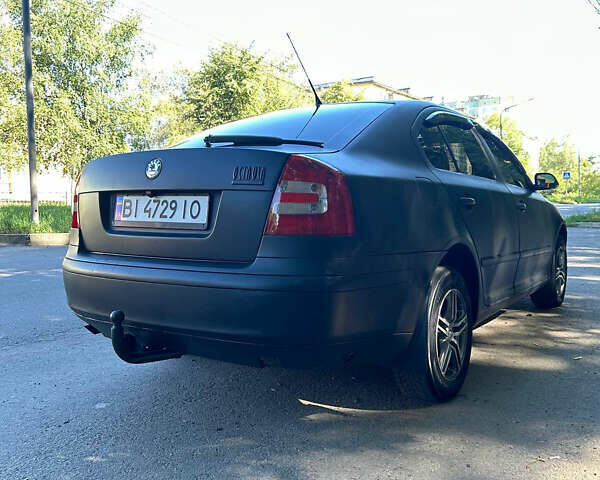 Чорний Шкода Октавія, об'ємом двигуна 1.6 л та пробігом 262 тис. км за 4999 $, фото 3 на Automoto.ua