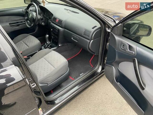 Черный Шкода Октавия, объемом двигателя 1.6 л и пробегом 292 тыс. км за 5250 $, фото 12 на Automoto.ua