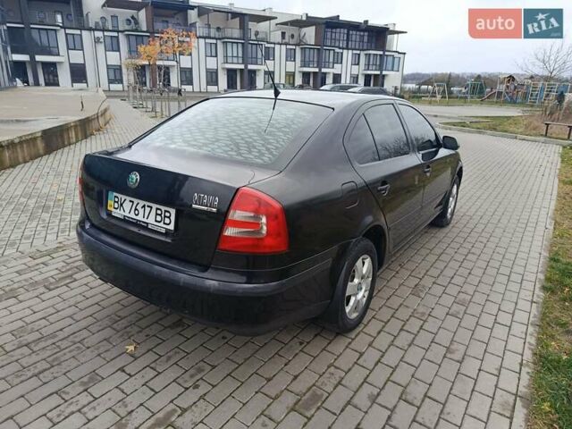 Черный Шкода Октавия, объемом двигателя 2 л и пробегом 240 тыс. км за 3500 $, фото 4 на Automoto.ua