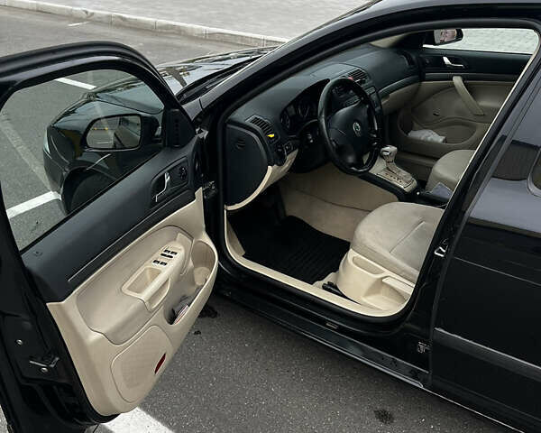 Черный Шкода Октавия, объемом двигателя 2 л и пробегом 355 тыс. км за 6700 $, фото 14 на Automoto.ua