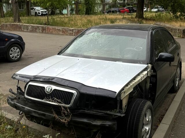 Черный Шкода Октавия, объемом двигателя 2 л и пробегом 200 тыс. км за 2500 $, фото 1 на Automoto.ua