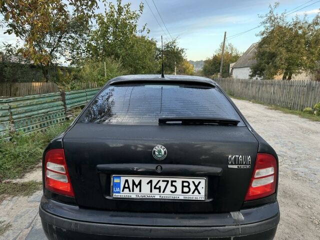 Черный Шкода Октавия, объемом двигателя 1.6 л и пробегом 210 тыс. км за 5200 $, фото 3 на Automoto.ua
